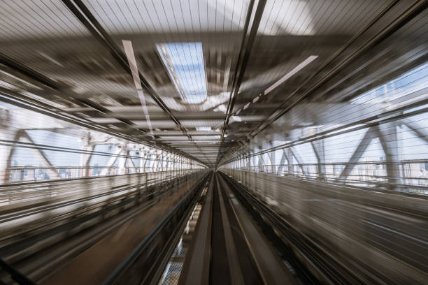 istock motion-blurred view from a moving train running in tunnel 1164464239
