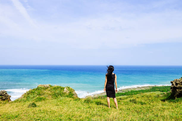 Single Asian girl having fun at Longpan Park, Kenting, Taiwa