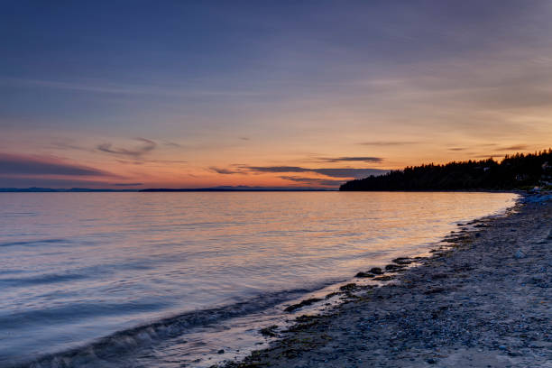 istock beach with sunset glow, White Rock, BC, Canada 1164469042