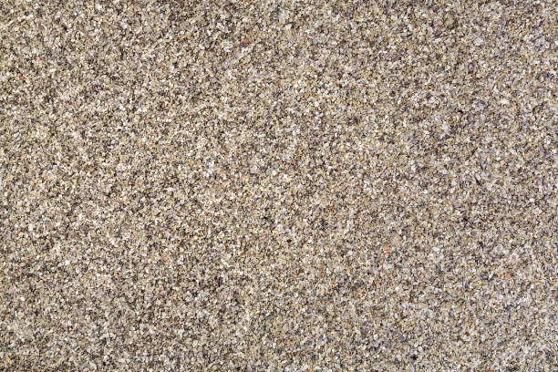 istock Horizontal gravel background from quartz sand. High quality texture in extremely high resolution. 1164470397