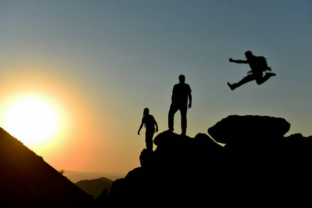 istock the joy of peak success, enthusiastic team and goal setting 1164483263