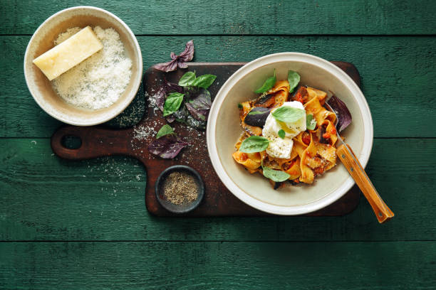 istock Pappardelle with eggplant, creamy tomato sauce and mozzarella 1164485278