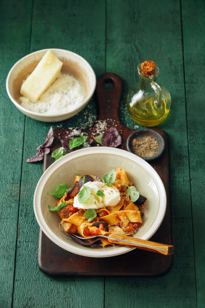 istock Pappardelle with eggplant, creamy tomato sauce and mozzarella 1164485316