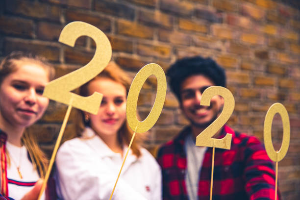istock New Years Eve celebrations - teenagers 1164497432