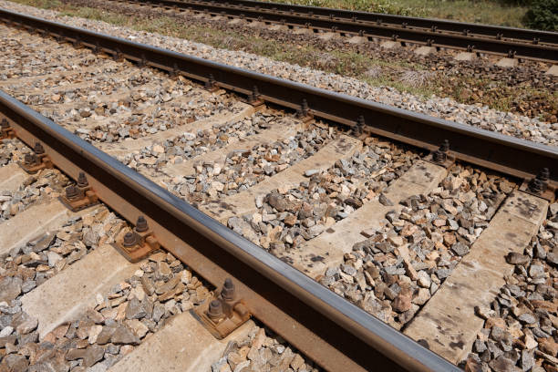 istock railway rails close view - abstract background, freight transportation concept 1164500200