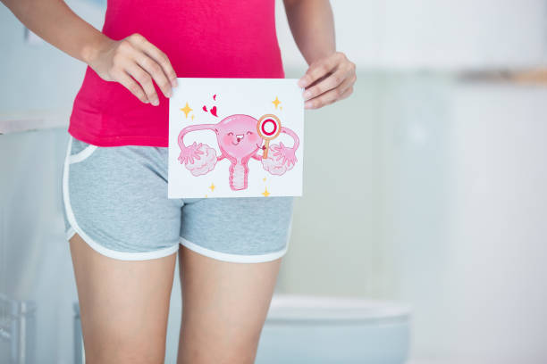 istock woman with cartoon womb billboard 1164500288