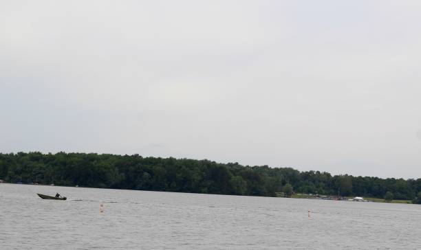 istock Boating on the lake of Cloudy Day 1164505463
