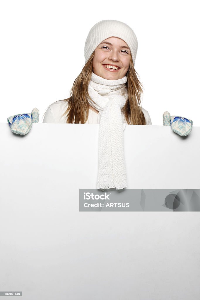 girl smiles girl smiles, the poster, studio, a white background holds in hands Adult Stock Photo