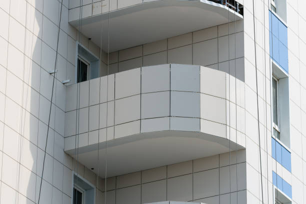 istock A new residential building on monolithic frame technology in the area with the existing infrastructure. Facade of ceramic tiles and glass. 1164511654