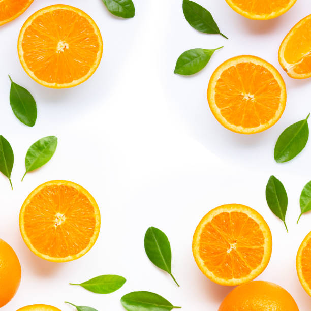istock Frame made of fresh orange citrus fruit with leaves isolated on white background. 1164513356