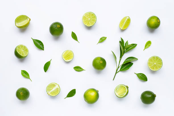 istock Limes with leaves isolated on white background. 1164513481