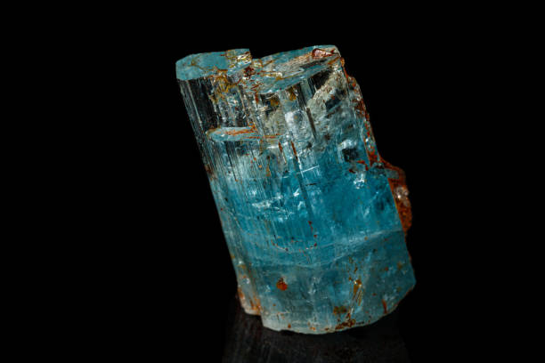 macro mineral stone aquamarine on a black background close up