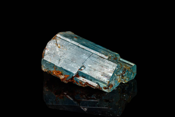 istock macro mineral stone aquamarine on a black background 1164515925