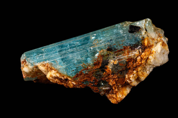 istock macro mineral stone aquamarine on a black background 1164516073