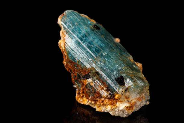 istock macro mineral stone aquamarine on a black background 1164516120