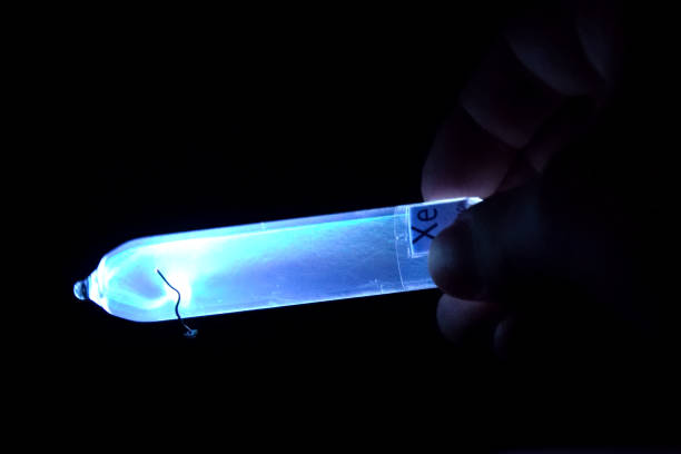 istock Xenon in vitro glows under influence of electricity. Laboratory Tests 1164516699