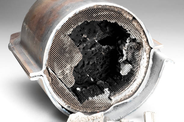 istock Cut muffler car with a platinum catalyst. 1164516725