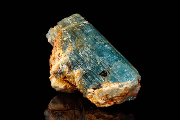 istock macro mineral stone aquamarine on a black background 1164516777