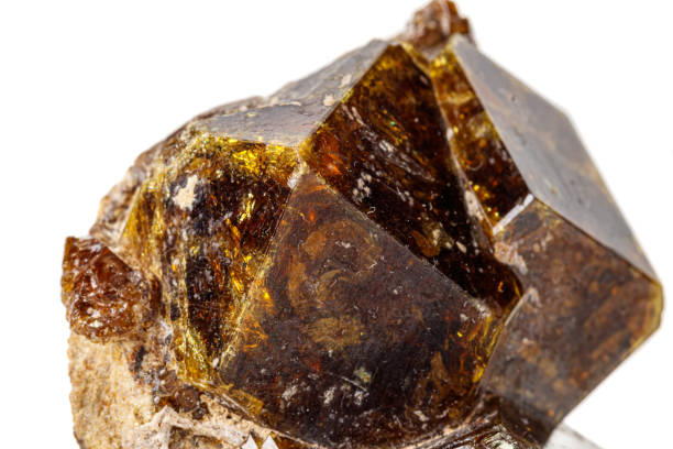 istock Macro stone Grossular mineral on white background 1164517924