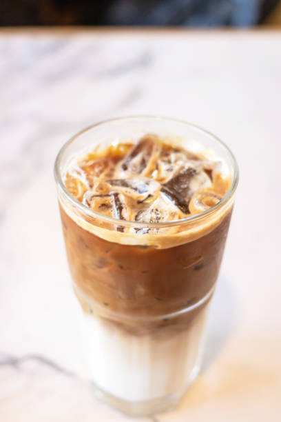 istock Iced latte coffee glass on table in cafe and restaurant. 1164519694