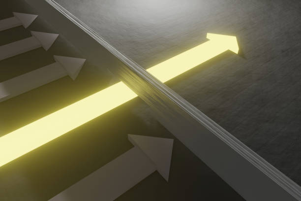 Glowing arrow breaking through wall on concrete background. Breakthrough and success concept. 3D Rendering stock photo