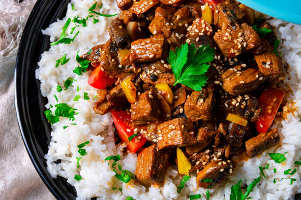 istock Tajin beef stew with rice paprika and sesame seeds 1164521105