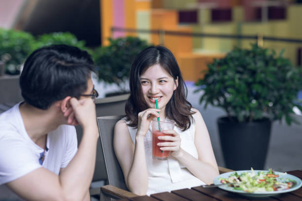 istock Couple at cafe talking during lunch 1164521138