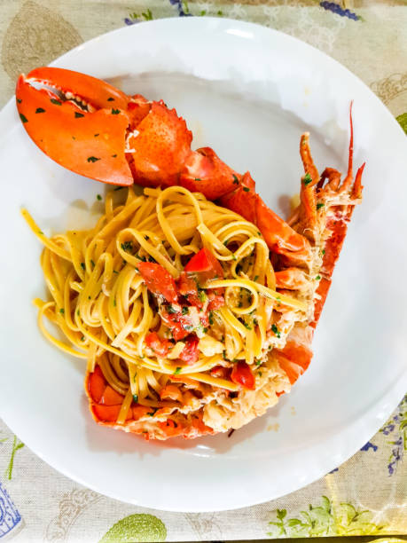 istock Italian seafood pasta with big lobster. Close up. 1164524084