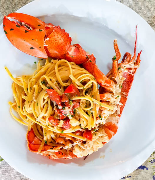 istock Italian seafood pasta with big lobster. Close up. 1164524094