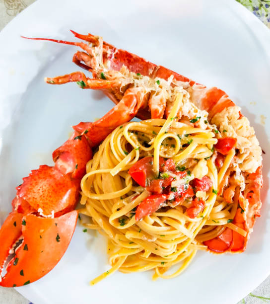 istock Italian seafood pasta with big lobster. Close up. 1164524103