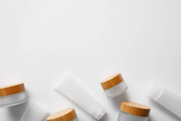 istock top view of few empty jars and cream tubes on white 1164524318