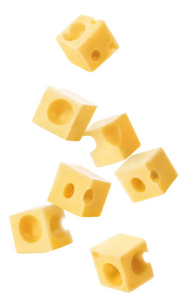 istock Pieces of cheese on white 1164525108