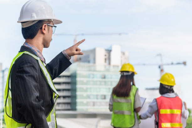 istock Construction Worker Planning Contractor Checking at factory construction. A man hold tablet for working. 1164526807