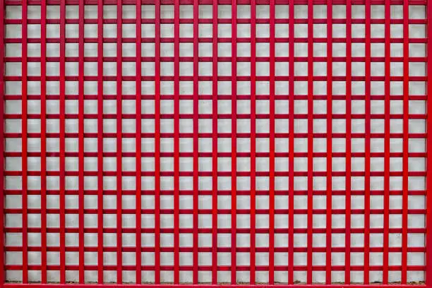 Photo of modern red steel grid wall