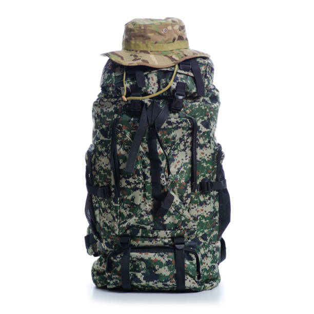istock Military backpack with accessories cap hat hiking 1164528015