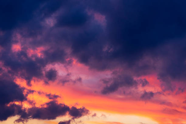 istock Cloudy sky on sunset with blue and yellow colors. 1164538723