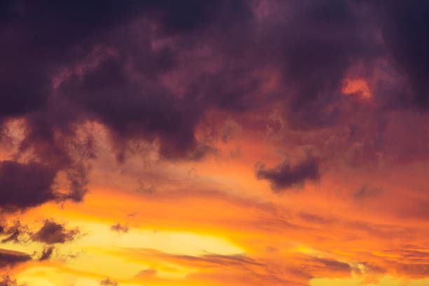 istock Cloudy sky on sunset with blue and yellow colors. 1164538726