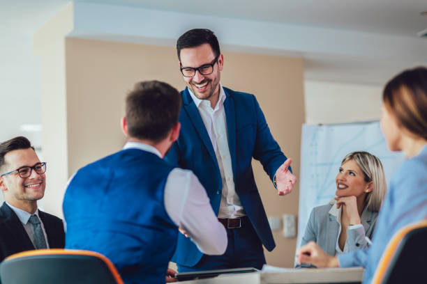 istock Business shaking hand with a client in office 1164540595