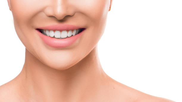 istock Woman smiling. Teeth whitening concept 1164547664