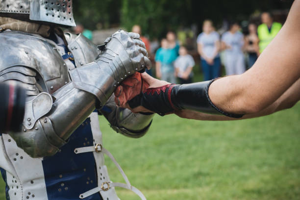 istock Knight and a squire on a traditional festival 1164551470