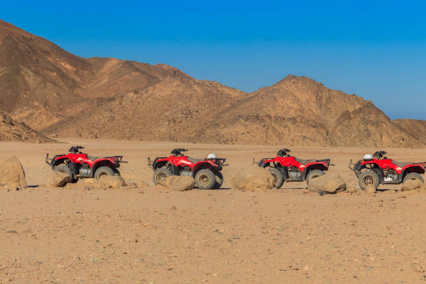 istock ATV quad bikes for safari trips in Arabian desert, Egypt 1164553912
