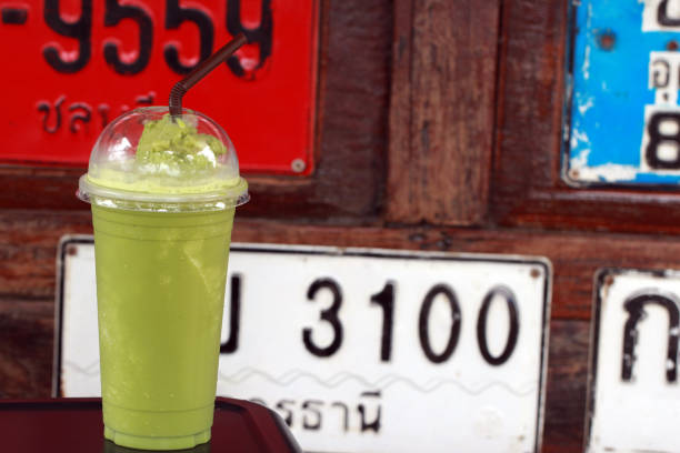 Green Tea Spinning with wooden and License plate background