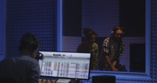 istock Foley artists and sound engineer working in studio 1164554850