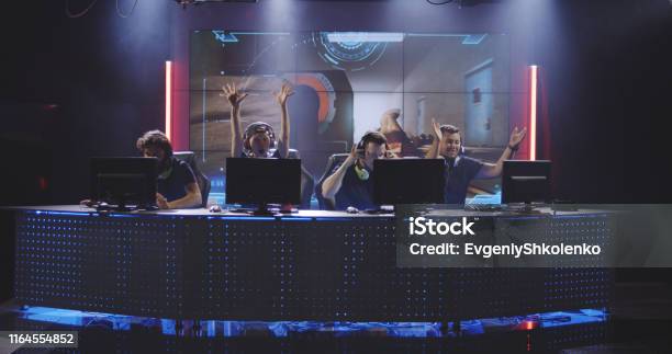 Gaming Team Winning Match At Tournament Stock Photo - Download Image Now - eSports, Gamer, Competition
