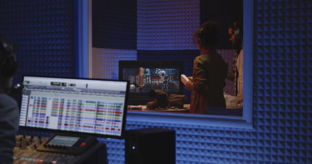 istock Foley artists and sound engineer working in studio 1164554859