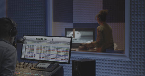 istock Foley artist and sound engineer working in studio 1164554876