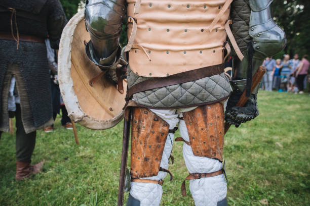 istock A knight in body armor with a shield and a mace 1164555922