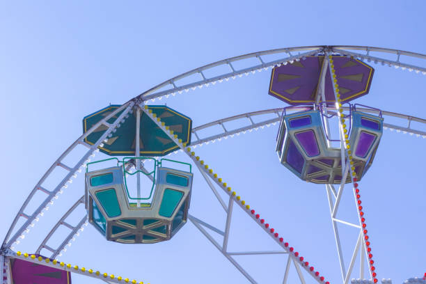 istock Cabs merry-go-round on a background of blue sky 1164556001