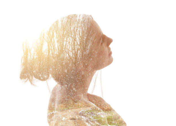 istock Multiple Exposure of young woman and nature 1164559360