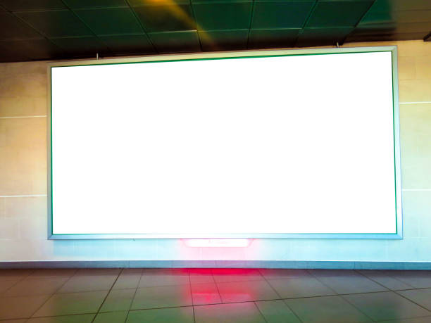 istock Big blank billboard on airport hall 1164559460